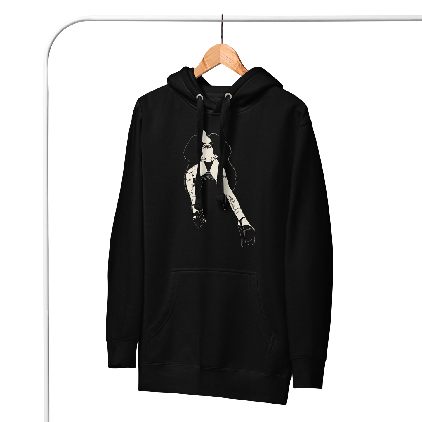 Black hoodie with graphic design of a woman sitting on a chair, wearing a bikini and a large fluffy coat, on a hanger against a white background