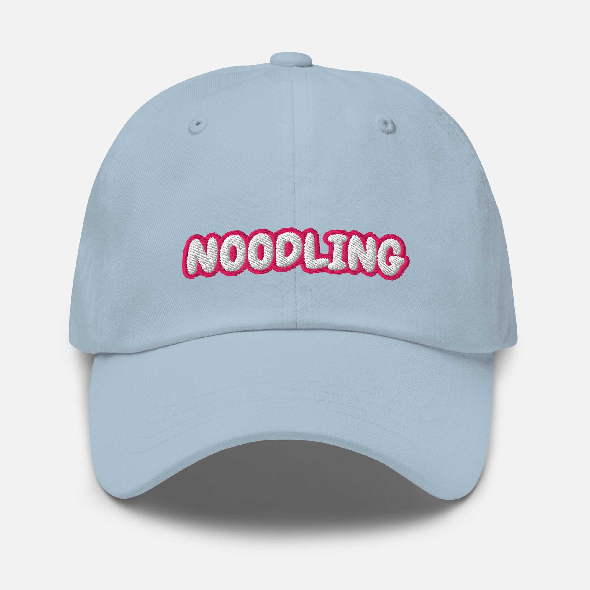 Light blue cap in front of a white background. The word 