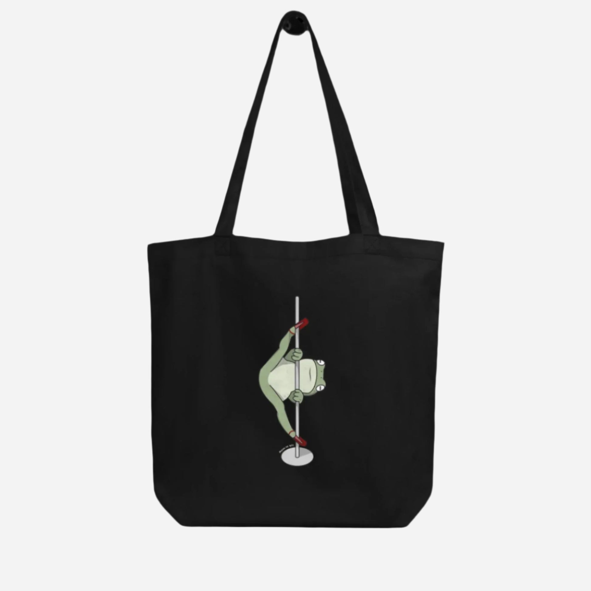 Black tote bag with a design showcasing a frog doing the splits on the pole